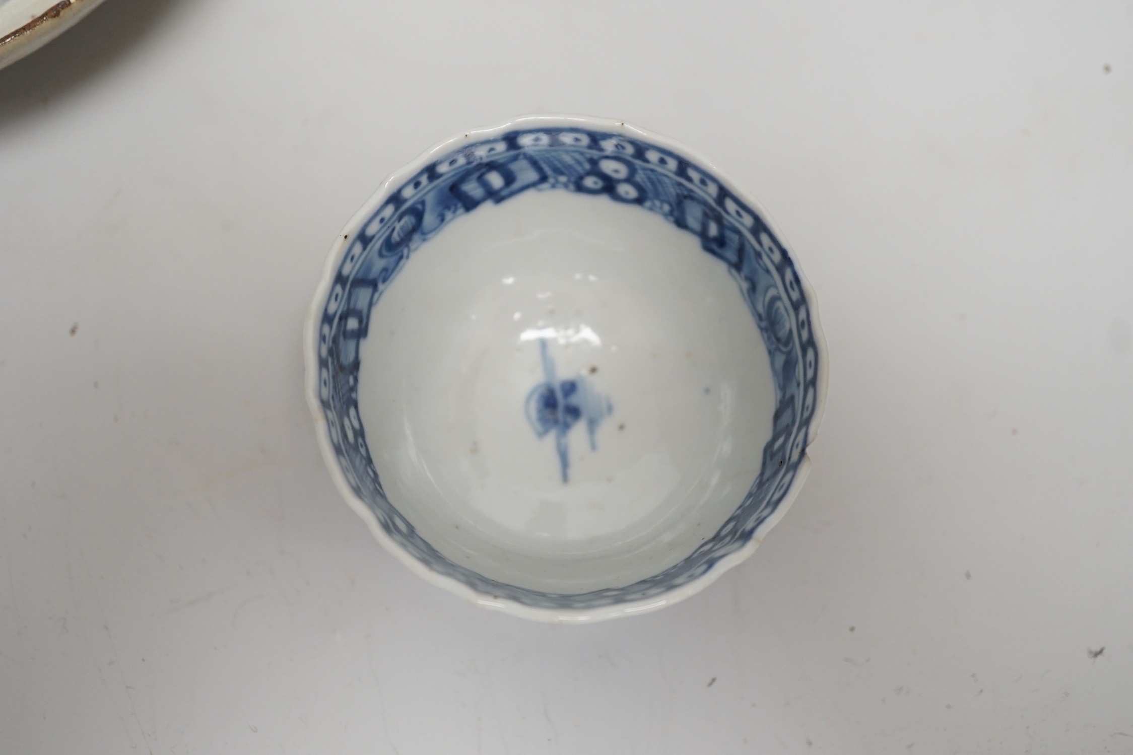 A Chinese sang de boeuf glazed bottle neck vase, together with a Chinese blue and white tea bowl, and a Chinese dish, tallest 23cm